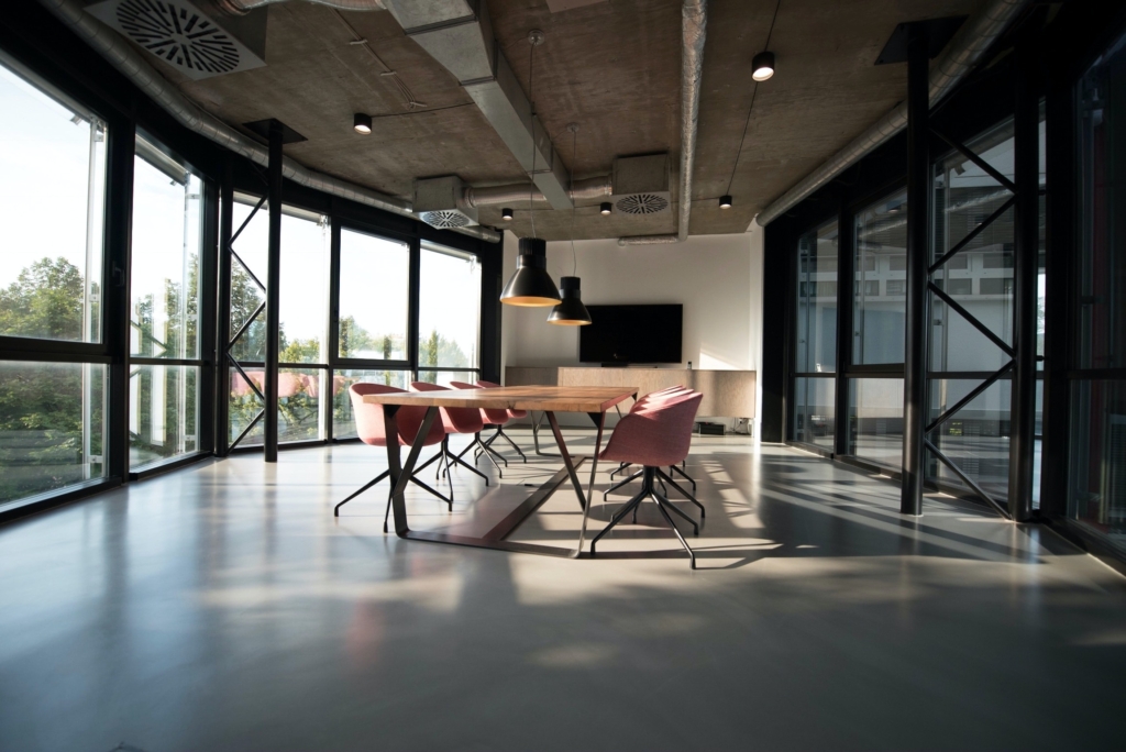 Modern conference room with pink chairs