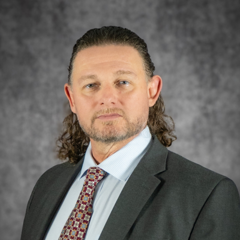 Portrait of man in suit and tie
