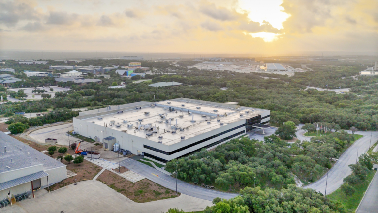 Aerial view of facility at sunrise